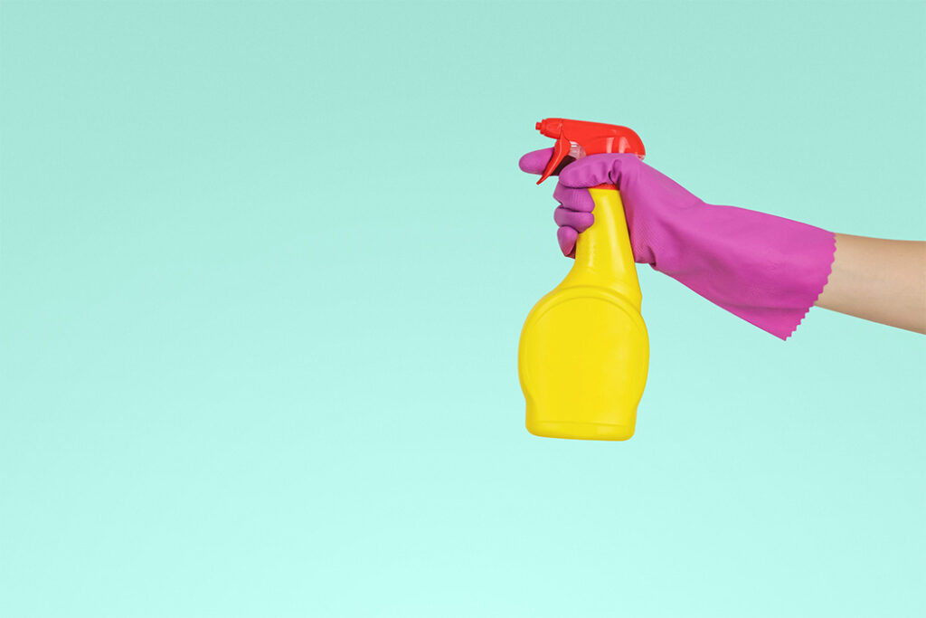 A Person Holding Plastic Spray-cleaner Bottle