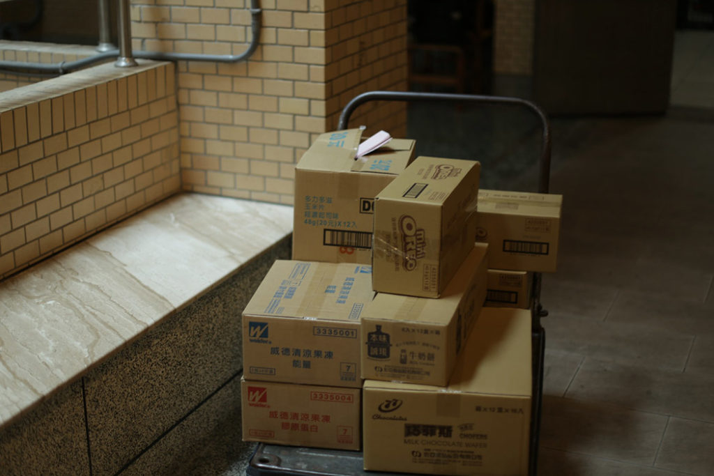 Cardboard Boxes On A Hand Truck